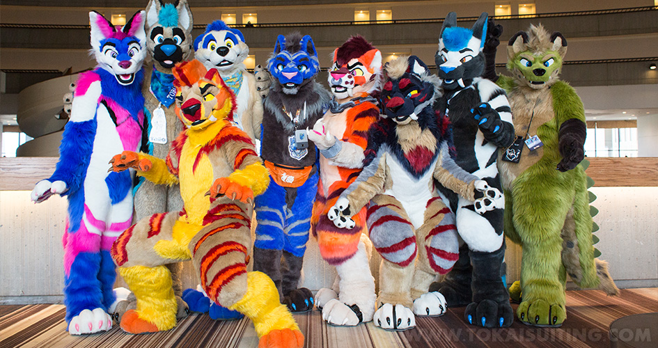 Group photo from Furry Weekend Atlanta, or FWA, 2024, of fursuiters from the fursuit maker Tokai Suiting.